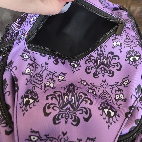Haunted Mansion-themed sling backpack is a purple crossbody bag - Picture 3 of 8